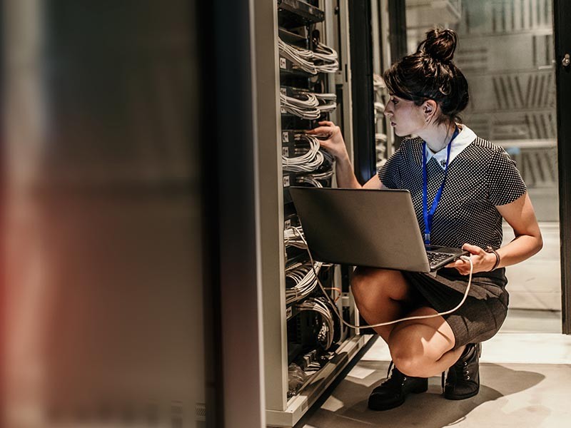 Women working on a server