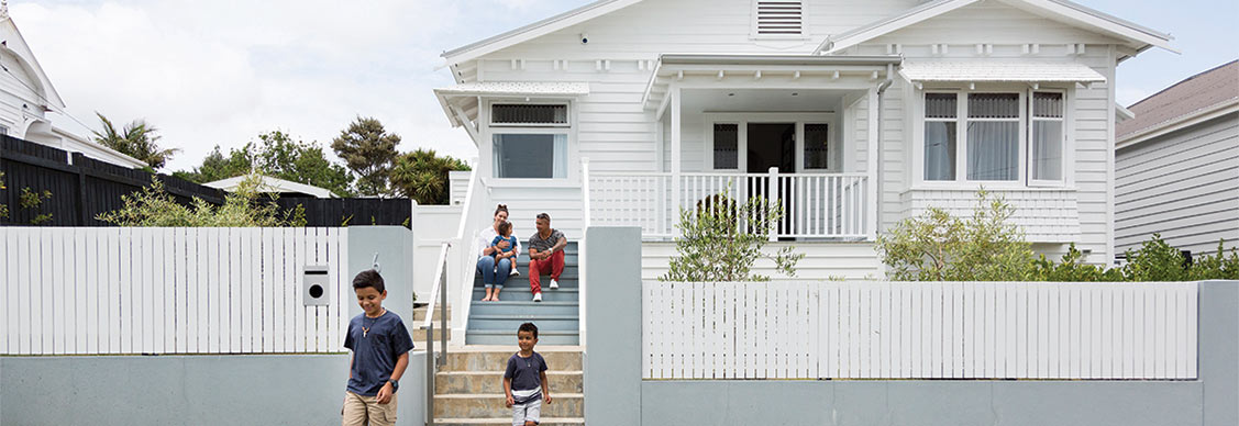 Family in front of their house