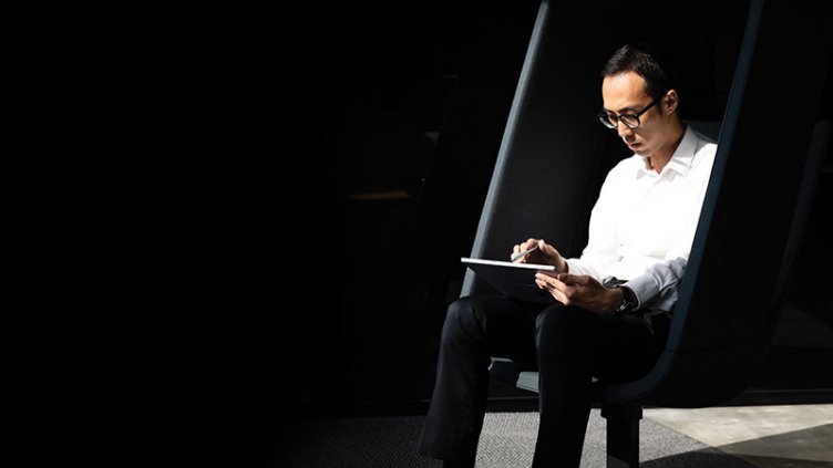 A man working on a tablet