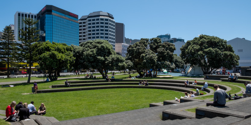 People sitting in Frank Kitts Park
