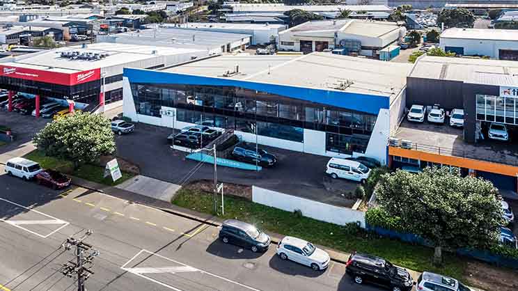Industrial building with offices and modern façade.