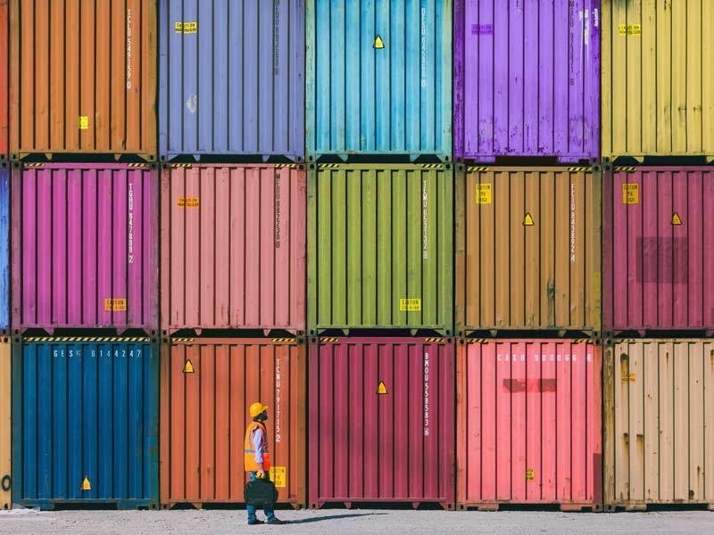 A man stands and see container