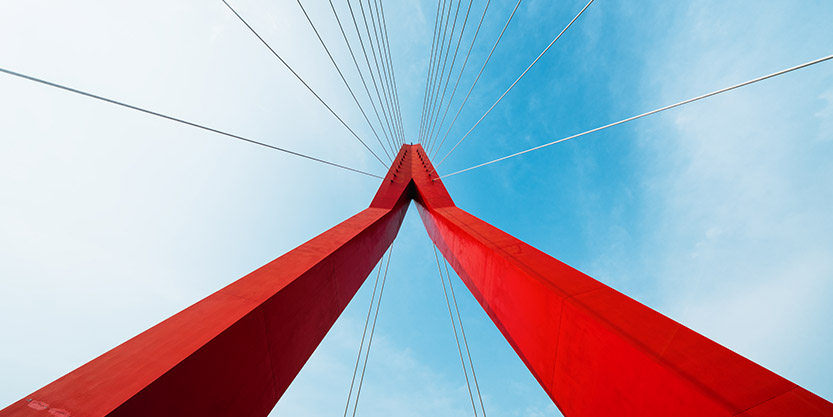 A close-up photo of a red bridge