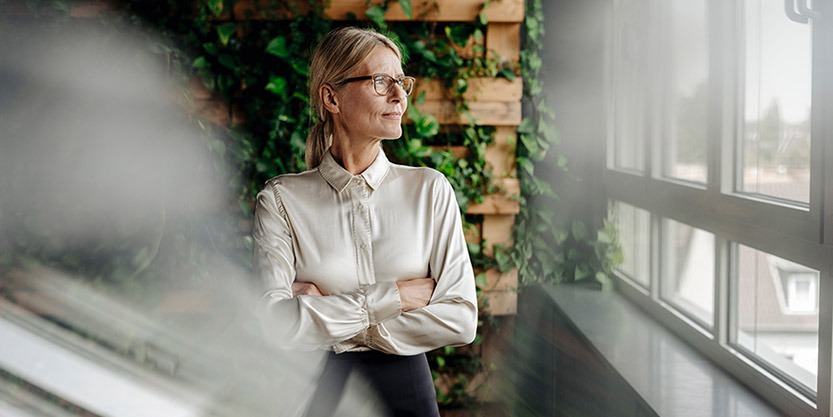 A woman looking out window