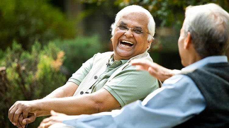 Two old men are enjoying the company