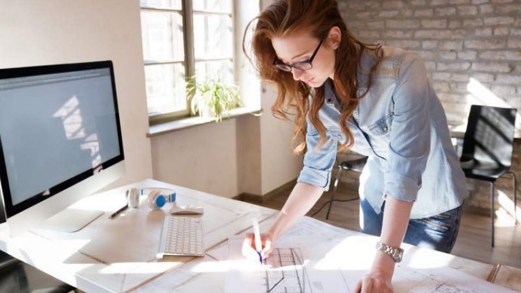 A woman working inside the office