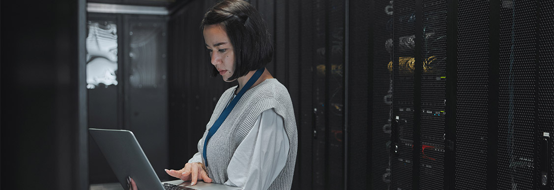 A young girl working on laptop