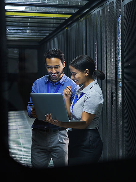 Two employees in data center