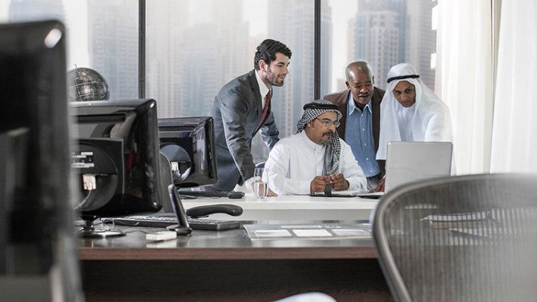 people working in office area