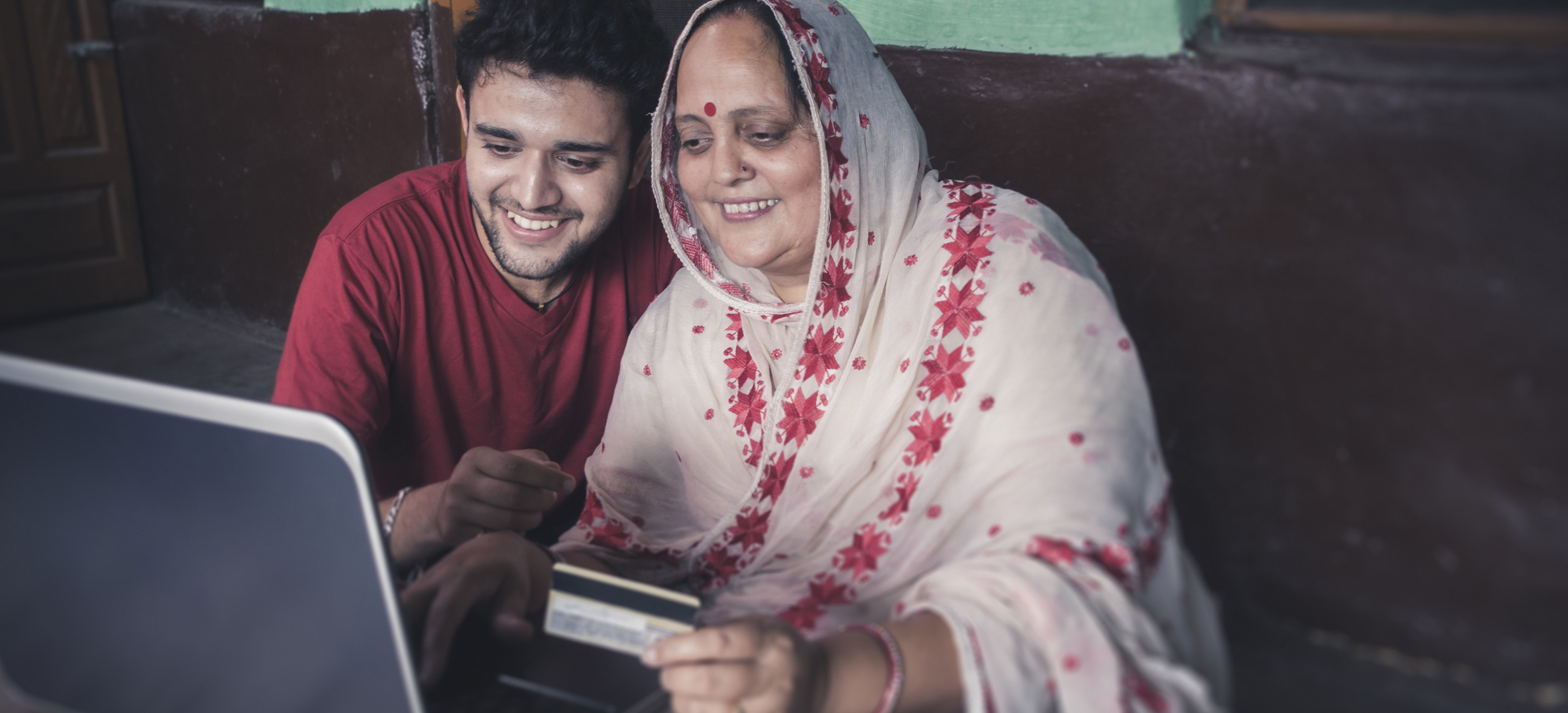 mother and son on lap top