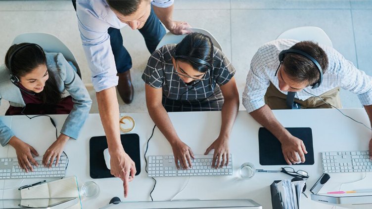 Customer service team working on new technology