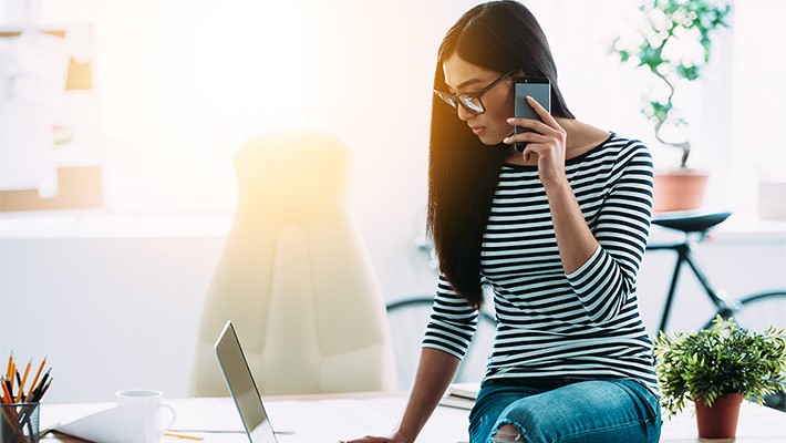 Investment advisor discussing over phone about investment opportunity